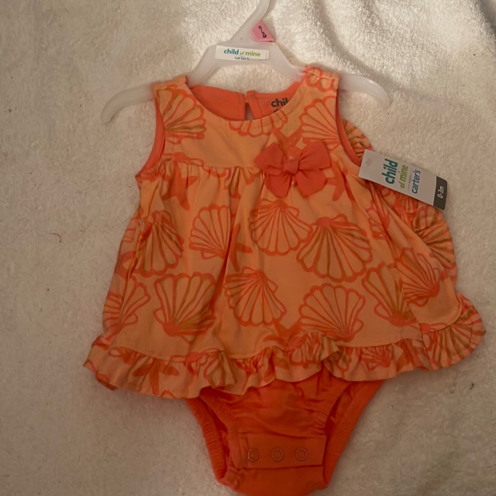 Orange Bodysuit For A Little Girl